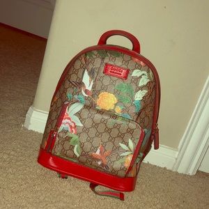 A Gucci Backpack.